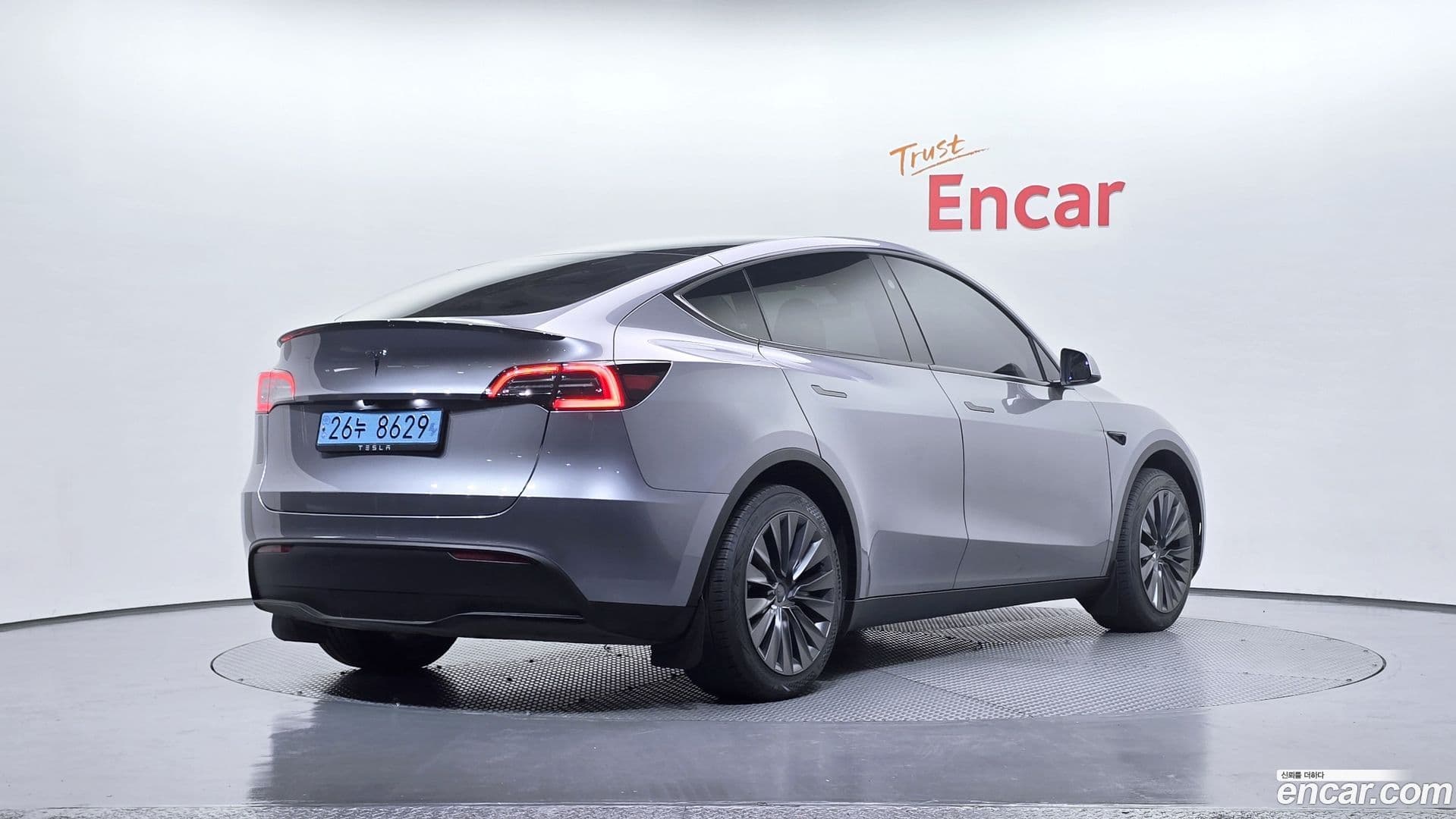 Main__Slider__Photo:Model Y Tesla 2025.1-1