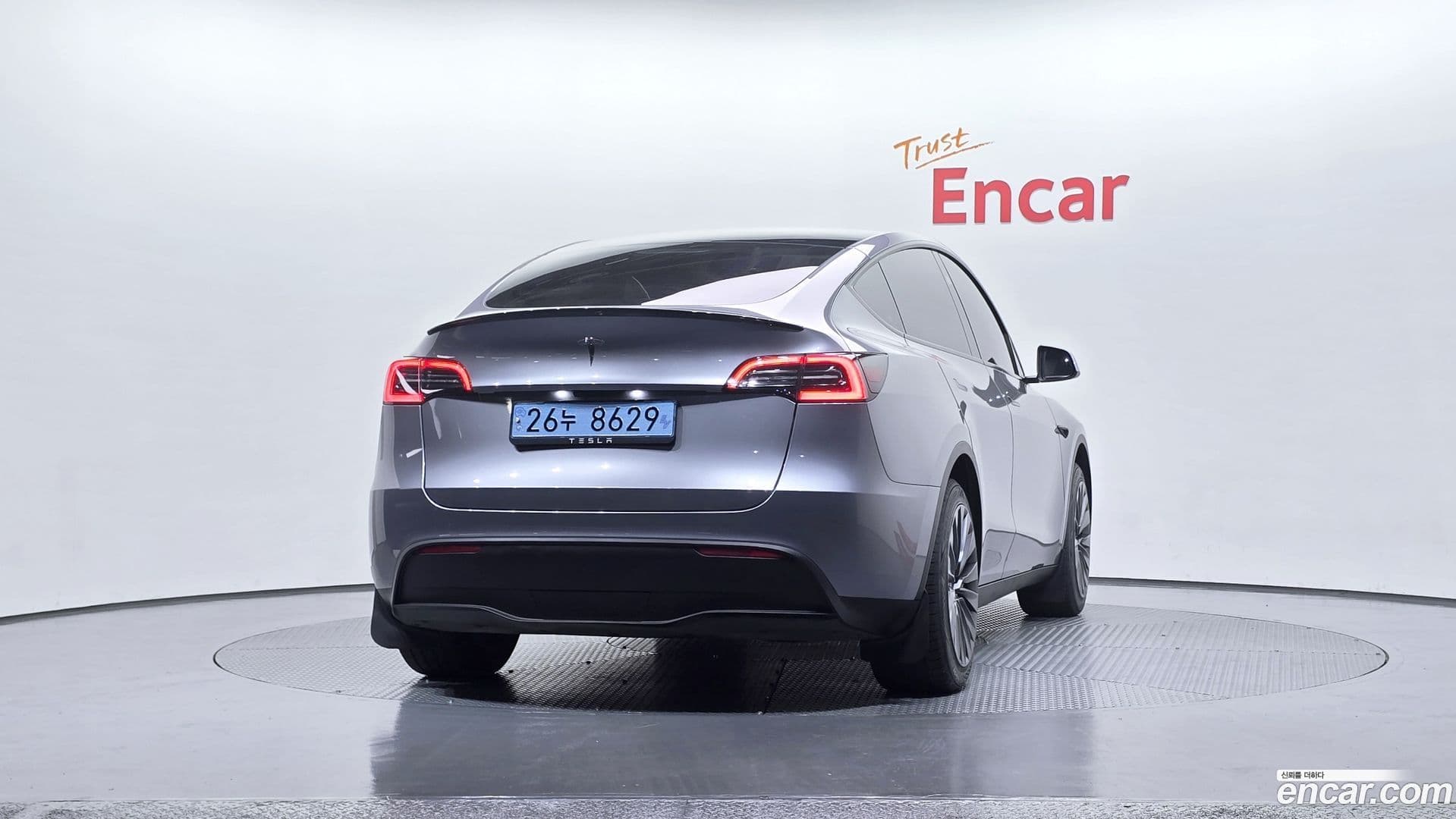Main__Slider__Photo:Model Y Tesla 2025.1-3