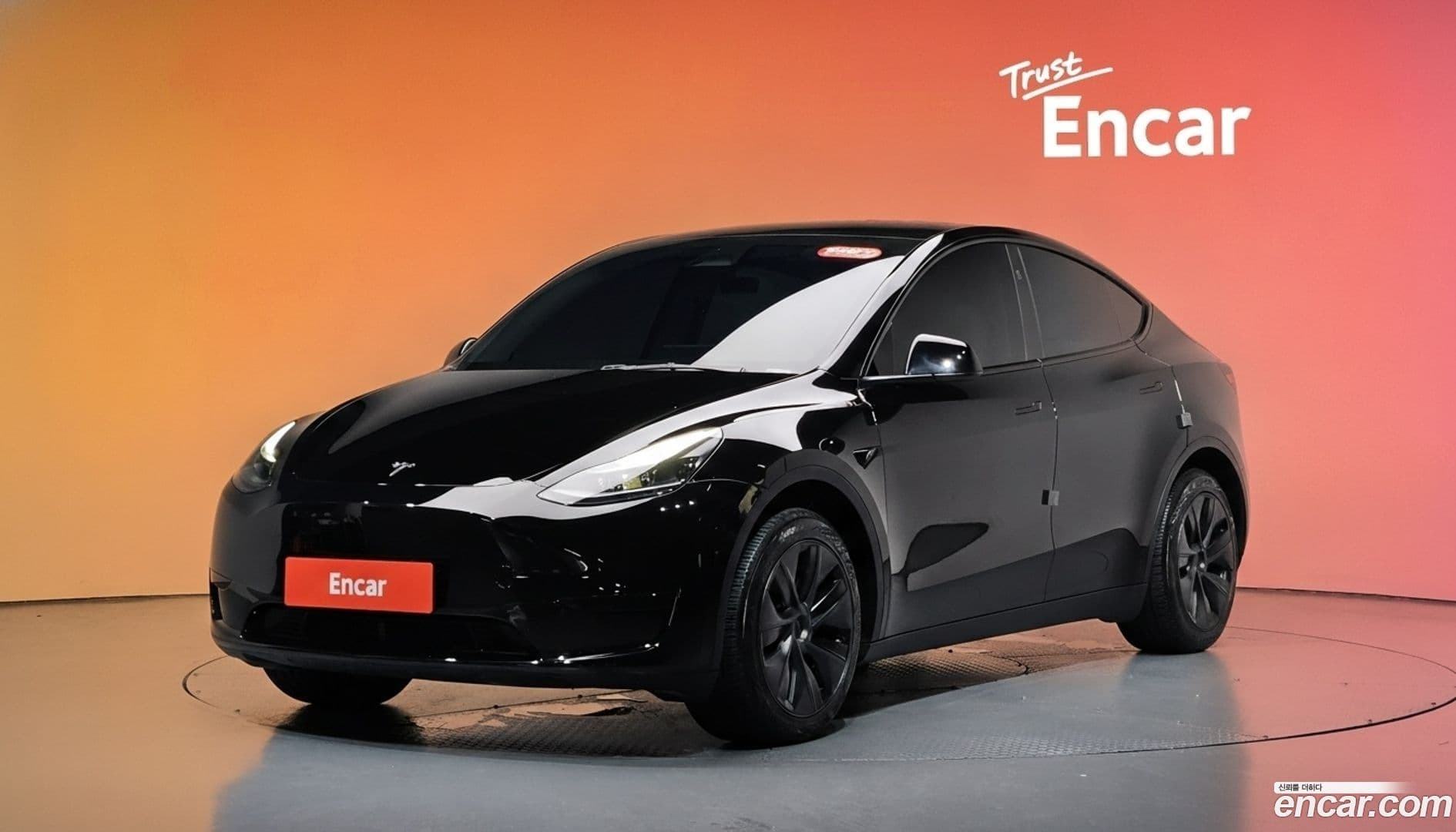 Main__Slider__Photo:Model Y Tesla 2025.1-0