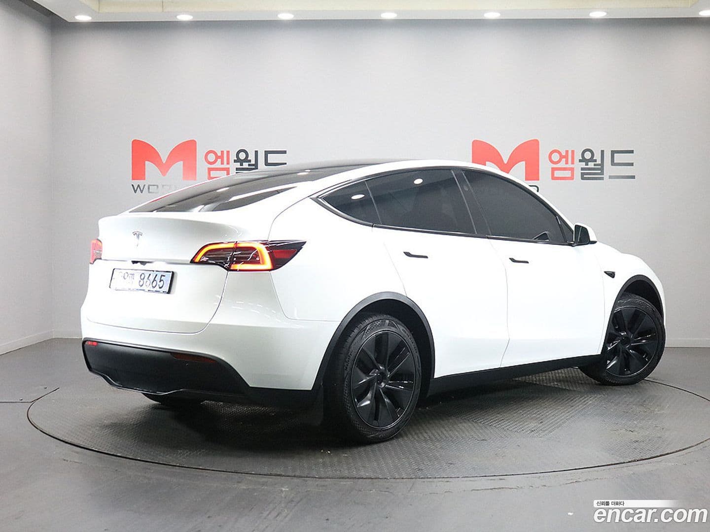 Main__Slider__Photo:Model Y Tesla 2024.5-0