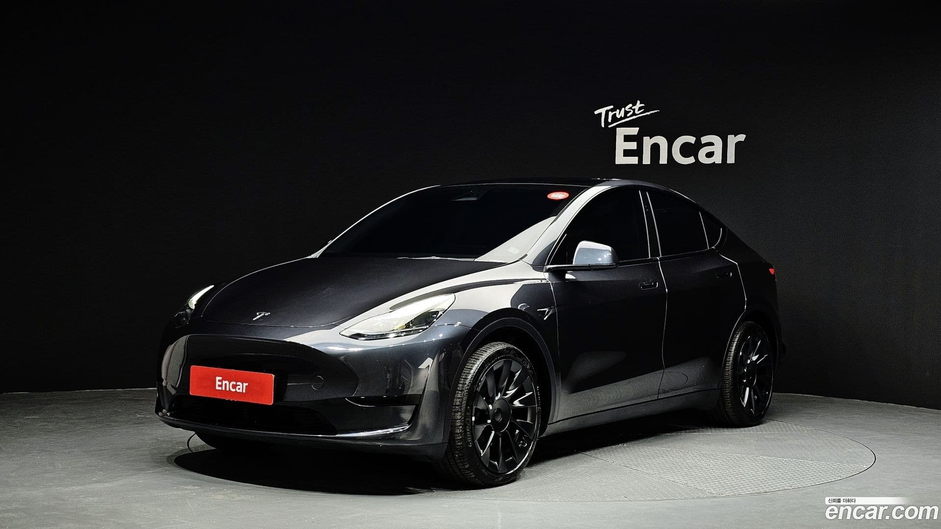 Main__Slider__Photo:Model Y Tesla 2025.1-0