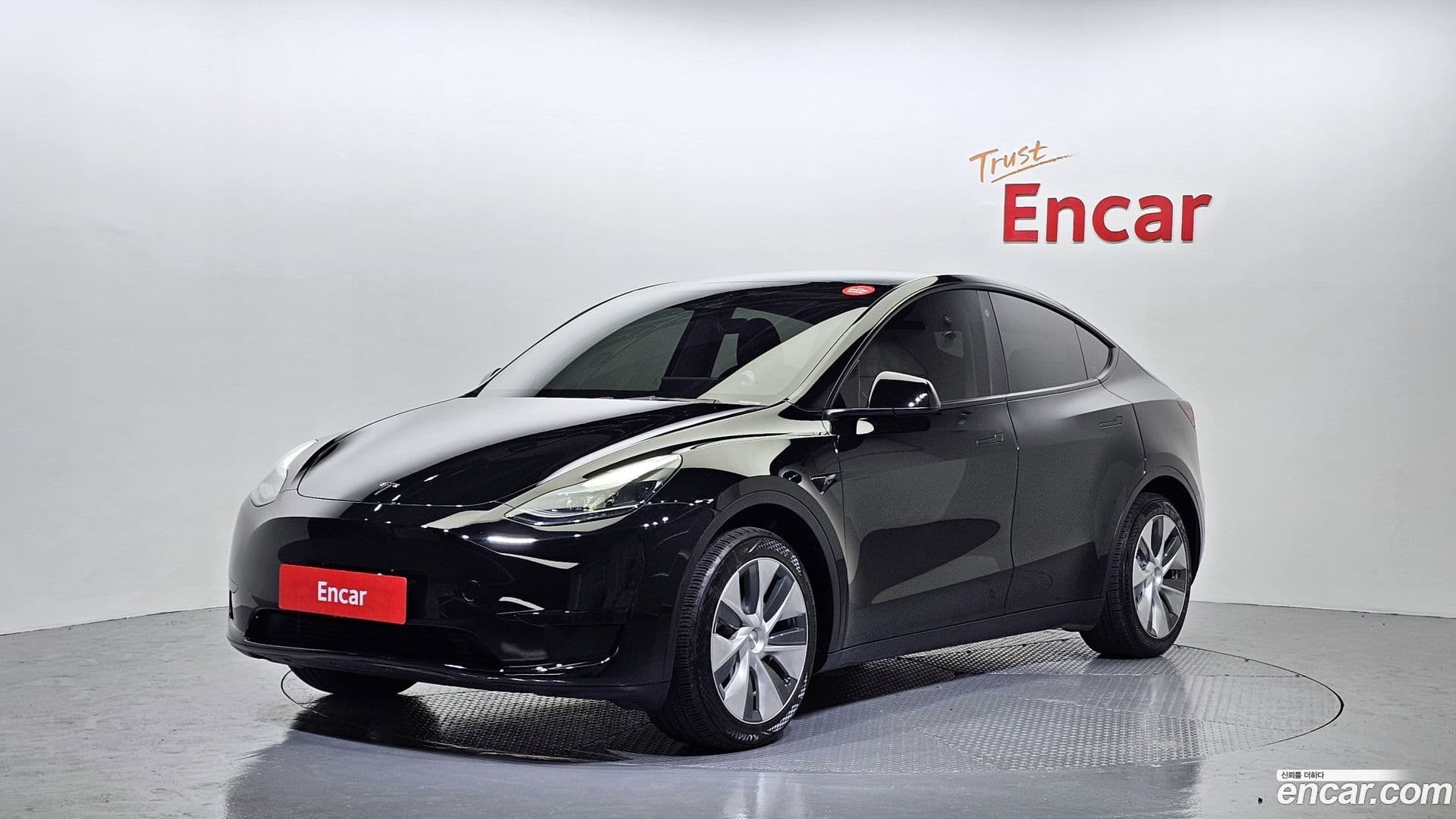 Main__Slider__Photo:Model Y Tesla 2023.8-0