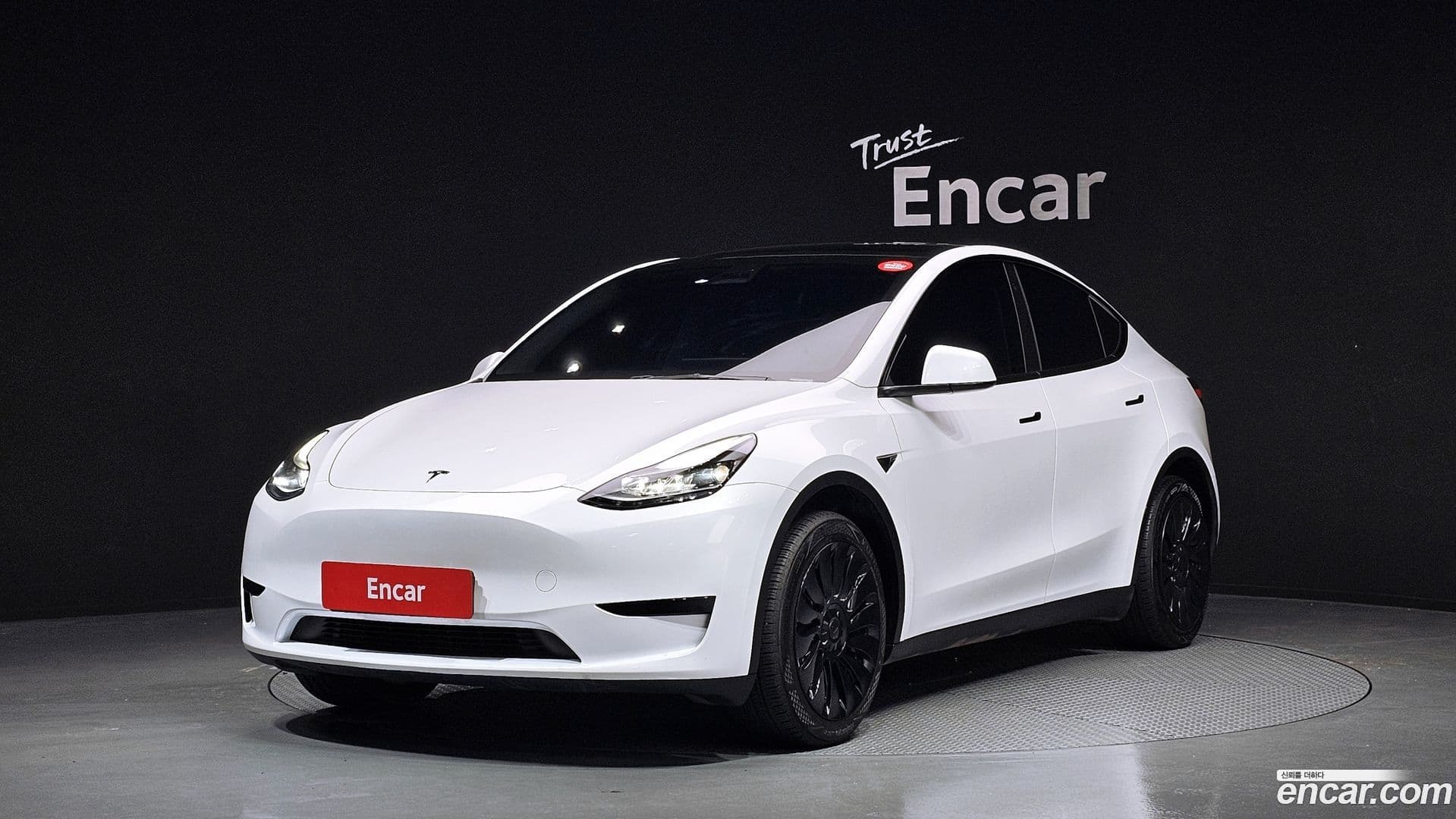 Main__Slider__Photo:Model Y Tesla 2023.10-0