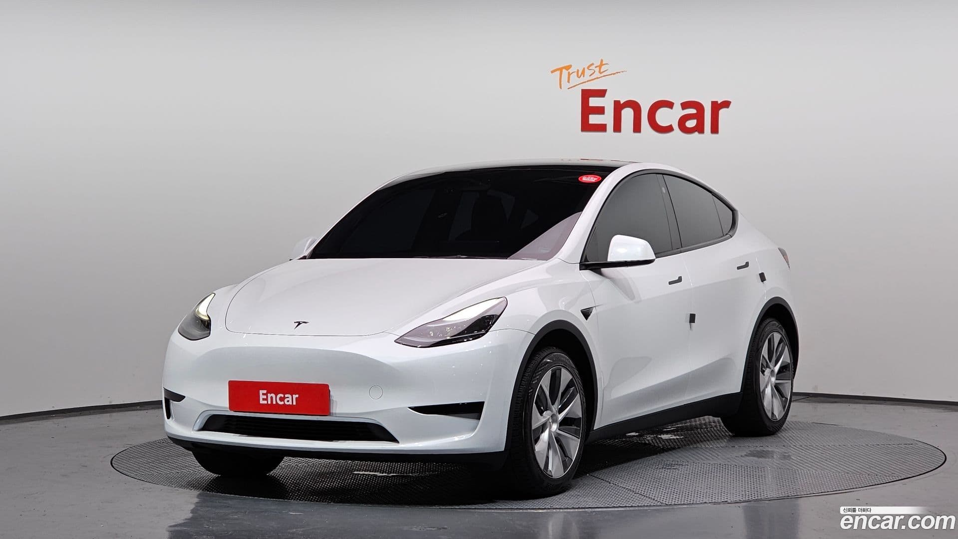 Main__Slider__Photo:Model Y Tesla 2023.10-0