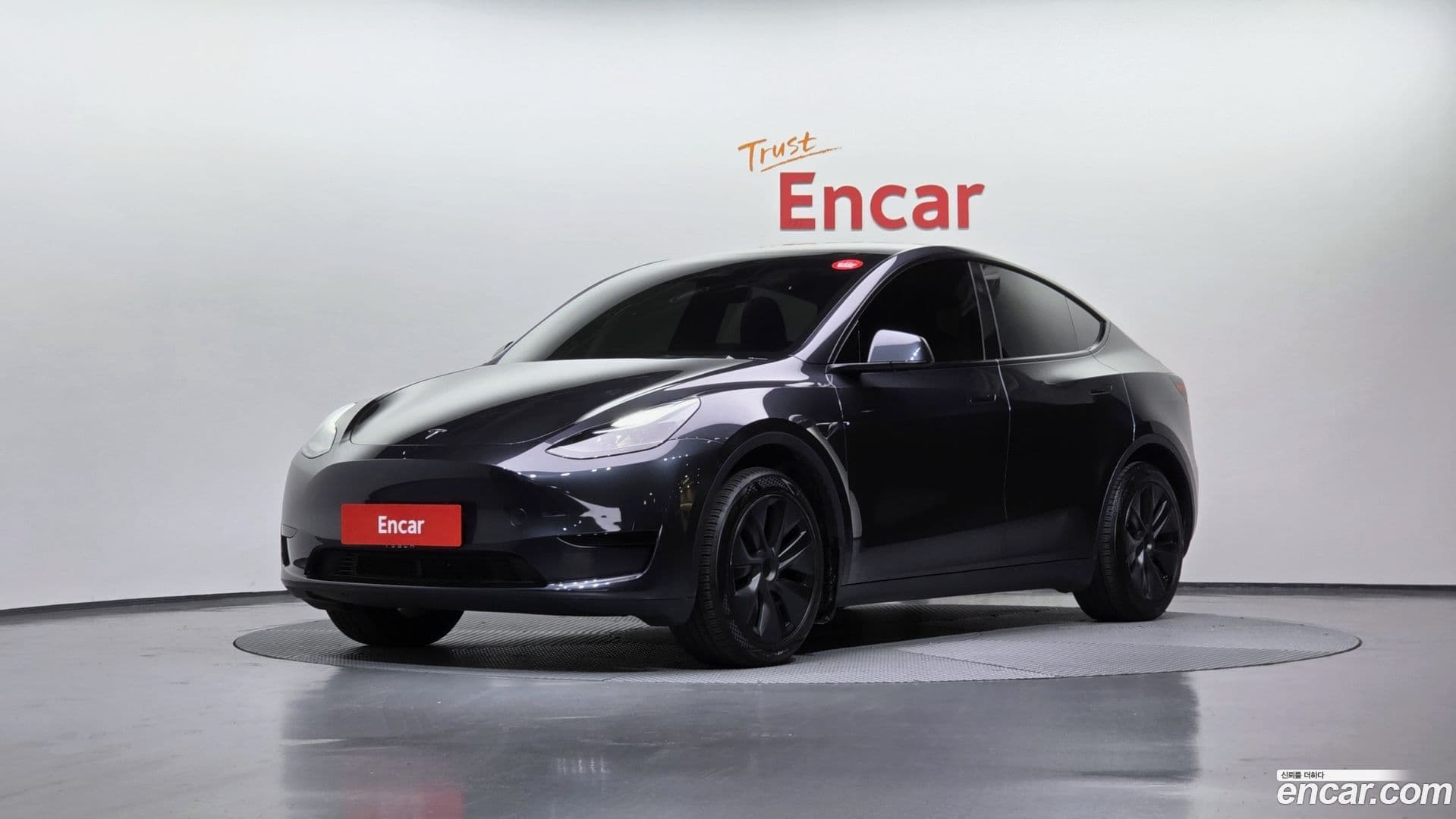 Main__Slider__Photo:Model Y Tesla 2025.1-0
