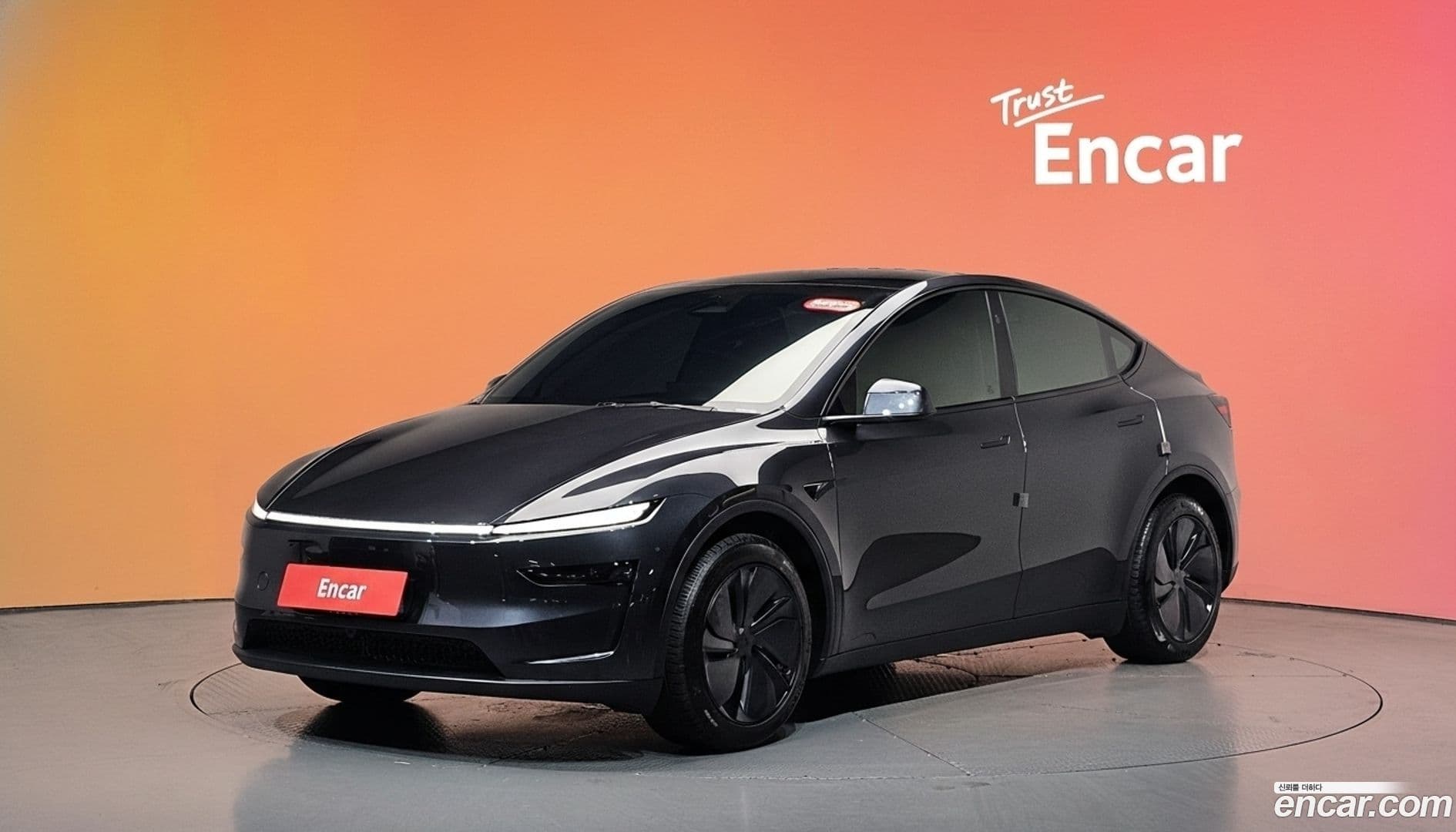 Main__Slider__Photo:Model Y Tesla 2025.4-0