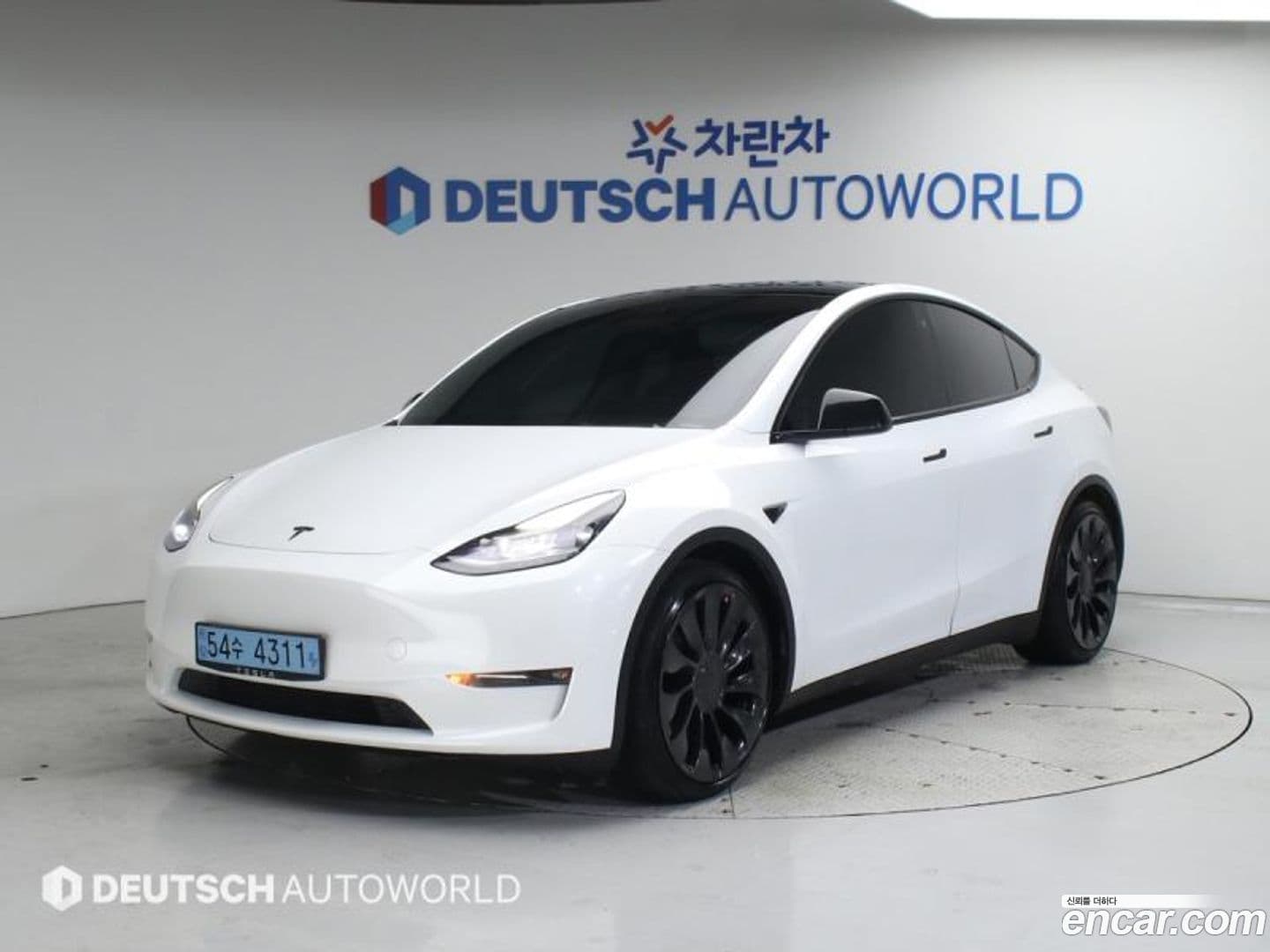 Main__Slider__Photo:Model Y Tesla 2021.10-0