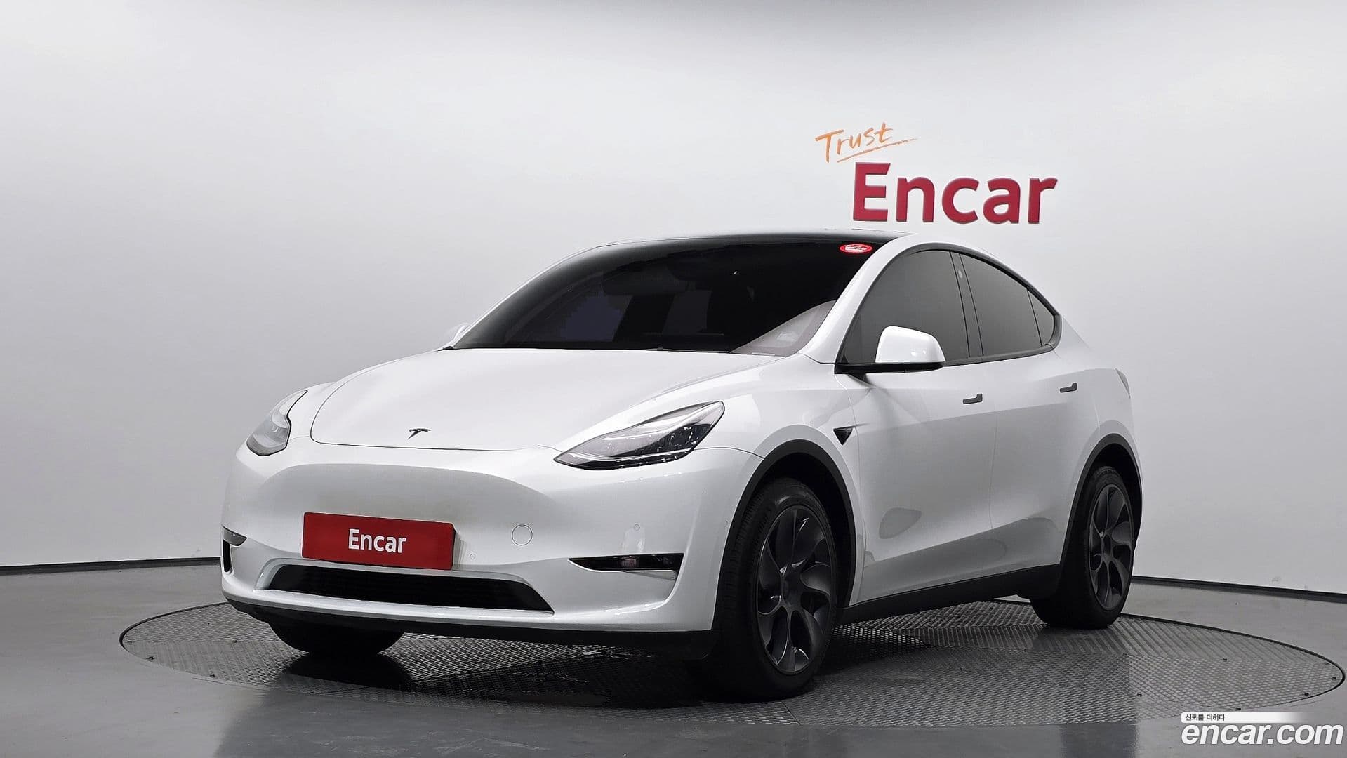 Main__Slider__Photo:Model Y Tesla 2022.5-0