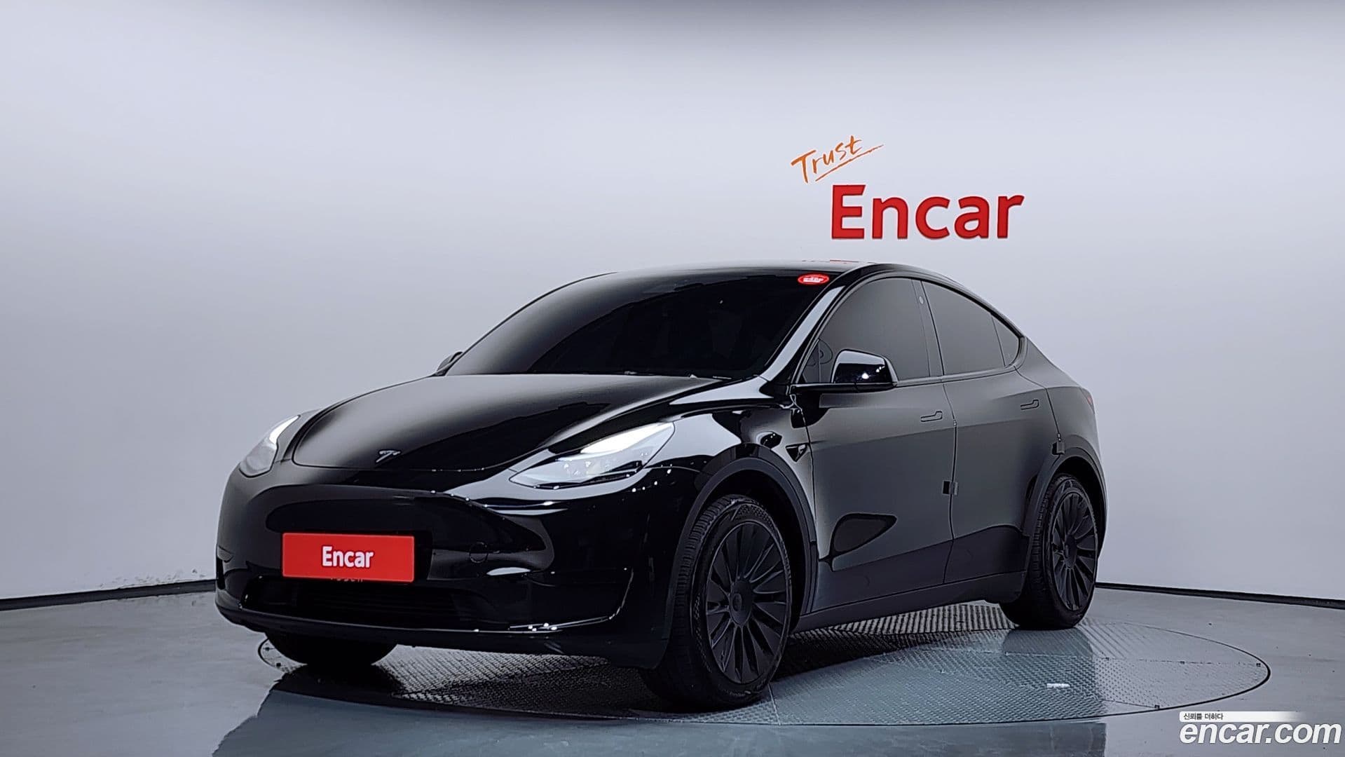 Main__Slider__Photo:Model Y Tesla 2023.10-0
