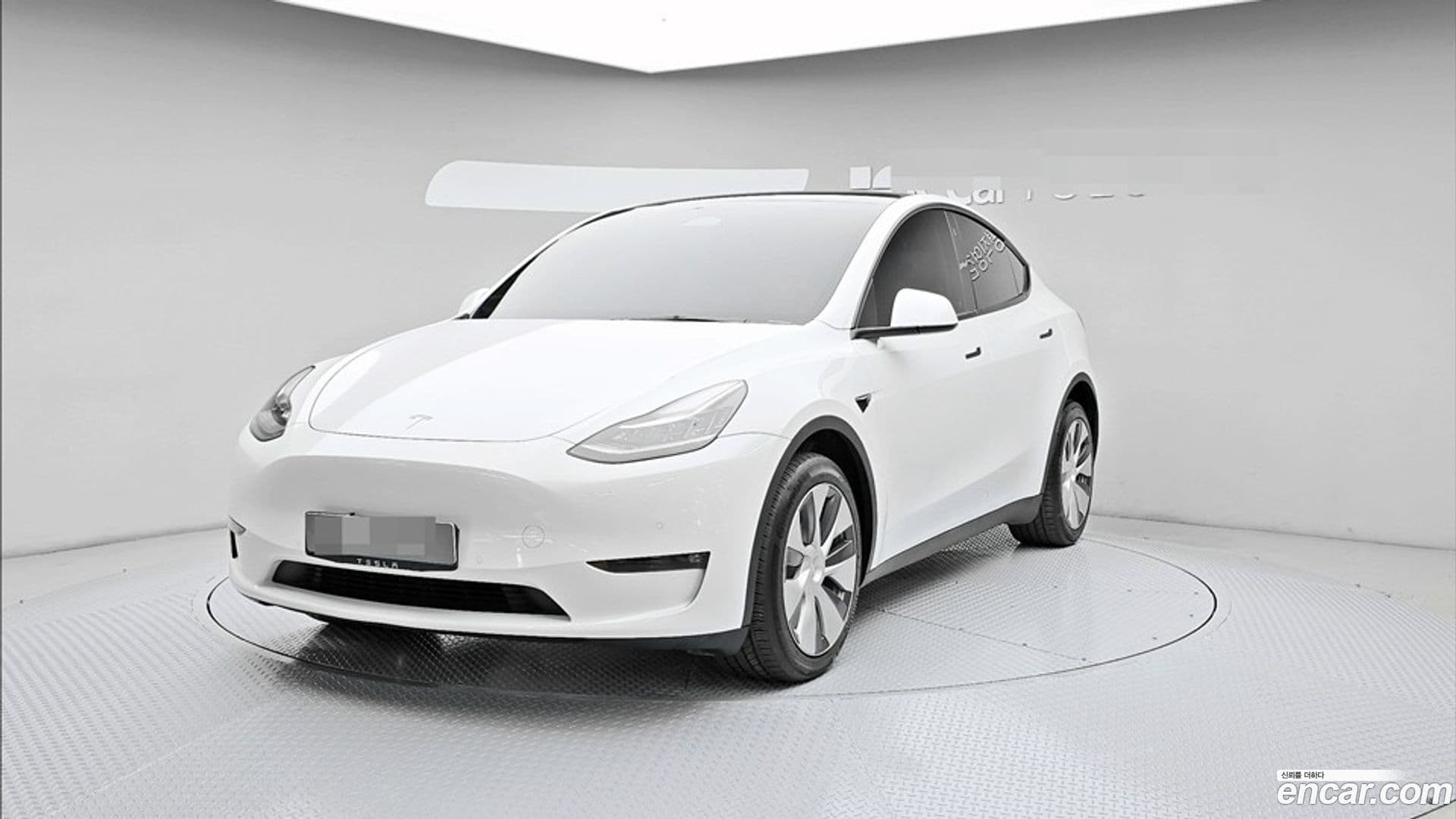 Main__Slider__Photo:Model Y Tesla 2022.10-0