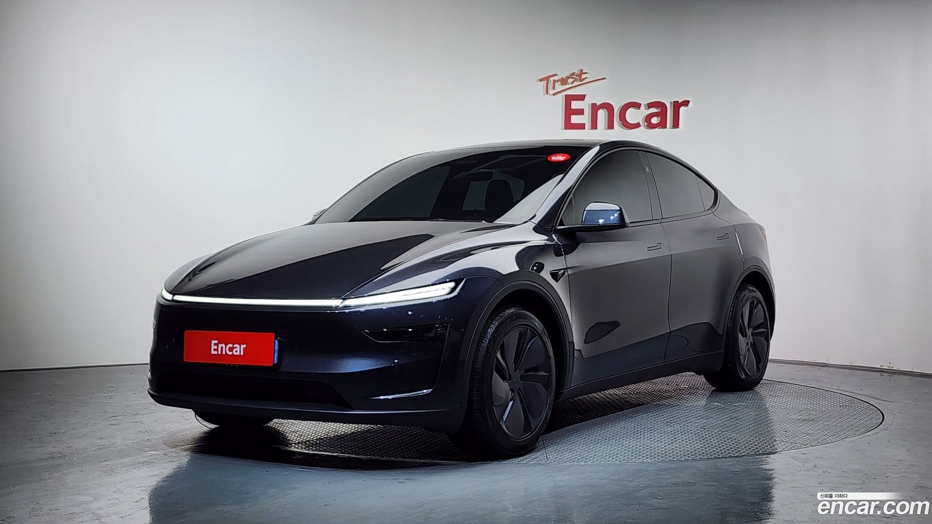 Main__Slider__Photo:Model Y Tesla 2025.4-0