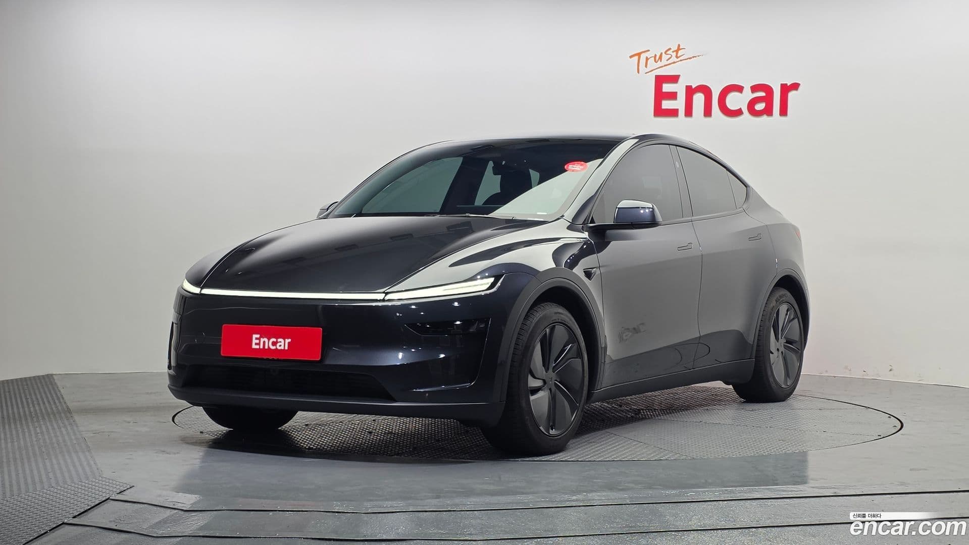 Main__Slider__Photo:Model Y Tesla 2025.4-0