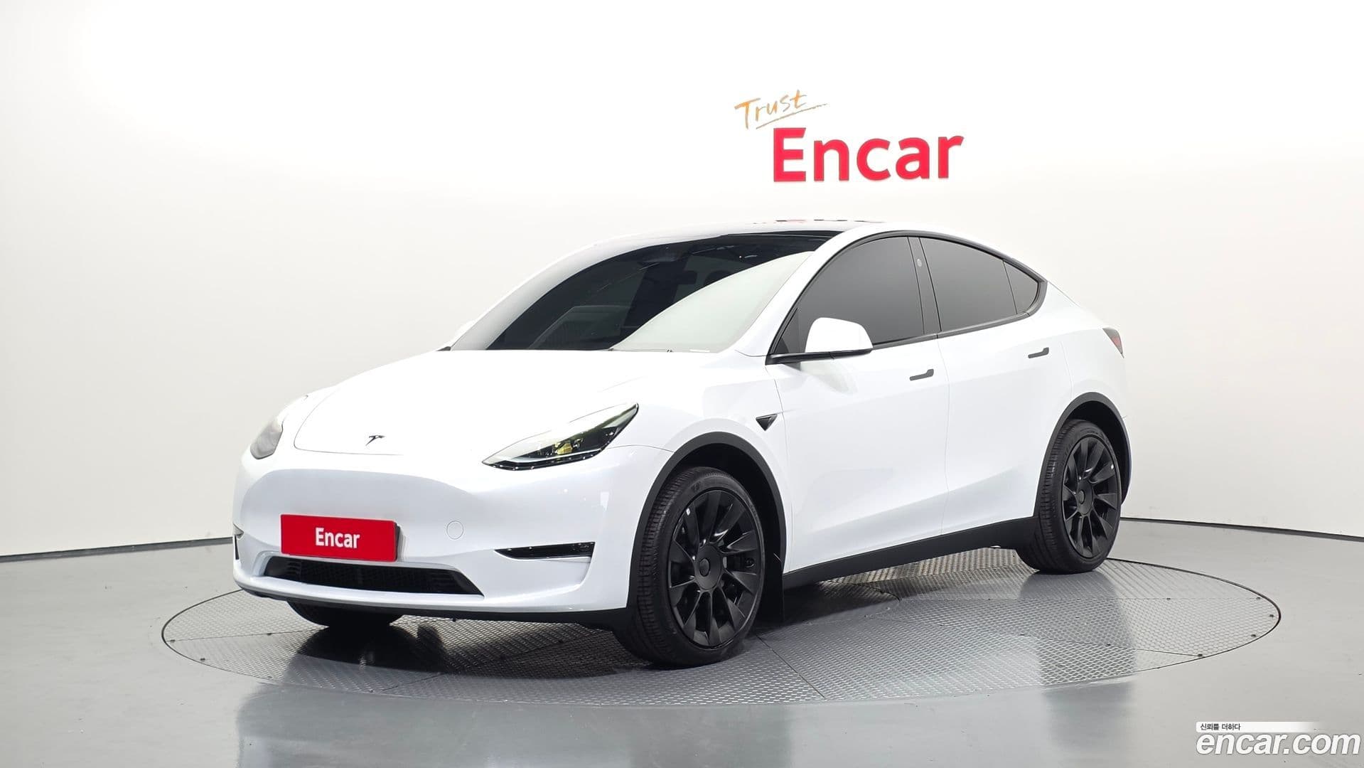 Main__Slider__Photo:Model Y Tesla 2024.5-0