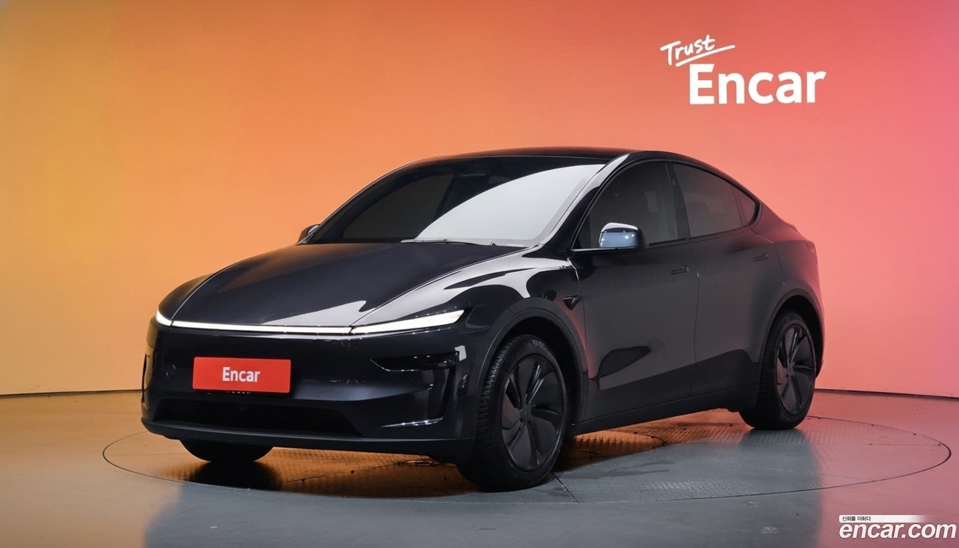 Main__Slider__Photo:Model Y Tesla 2025.4-0