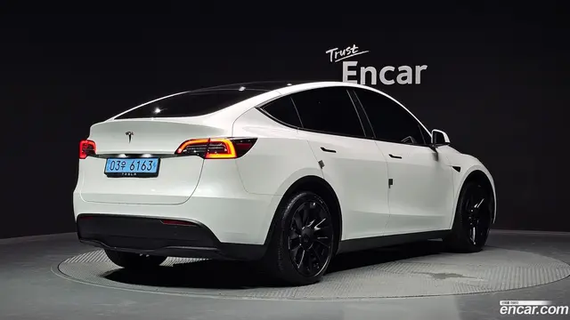 Main__Slider__Photo:Model Y Tesla 2023.8-1