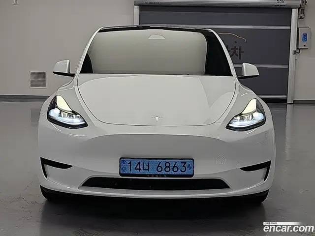 Main__Slider__Photo:Model Y Tesla 2024.2-1