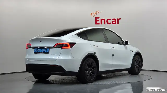 Main__Slider__Photo:Model Y Tesla 2024.7-1