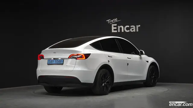 Main__Slider__Photo:Model Y Tesla 2024.9-1
