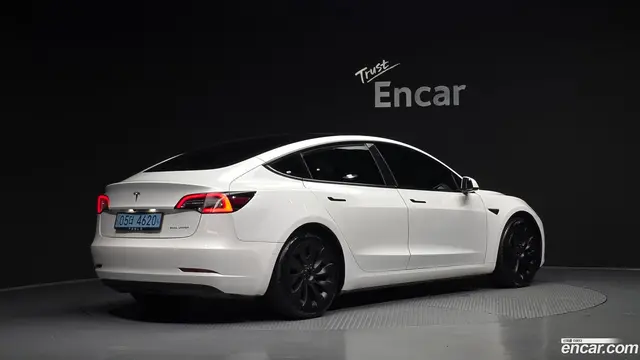 Main__Slider__Photo:Model 3 Tesla 2022.2-1