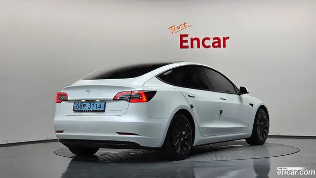 Main__Slider__Photo:Model 3 Tesla 2022.2-1