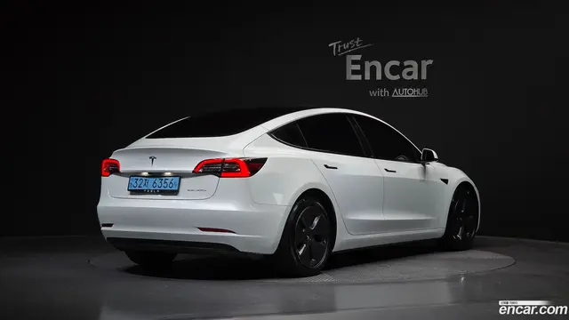 Main__Slider__Photo:Model 3 Tesla 2022.1-1