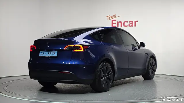 Main__Slider__Photo:Model Y Tesla 2025.1-1