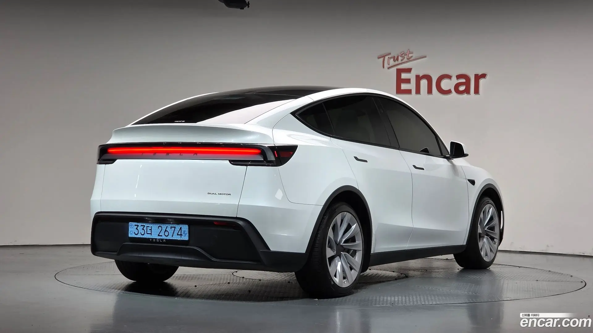 Main__Slider__Photo:Model Y Tesla 2025.4-1