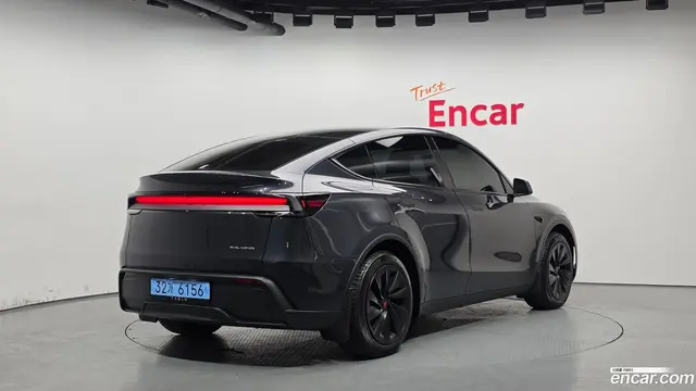 Main__Slider__Photo:Model Y Tesla 2025.3-1