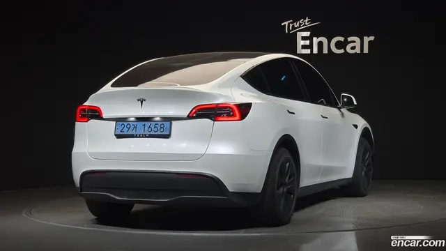 Main__Slider__Photo:Model Y Tesla 2024.6-1