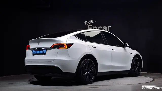 Main__Slider__Photo:Model Y Tesla 2024.7-1