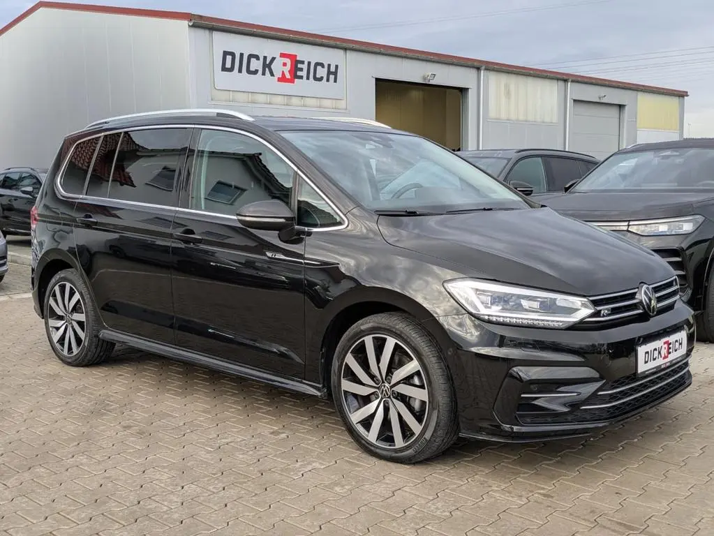 Main__Slider__Photo:Volkswagen Touran 2.0 DSG R-Line High. Pano 7-Si IQ.Dri AHK 06/2025-0
