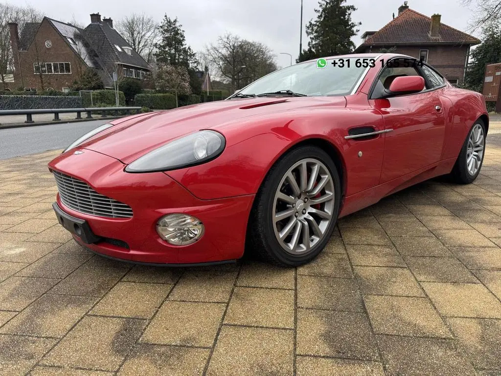 Main__Slider__Photo:Aston Martin Vanquish V12 5.9 01/2003-0