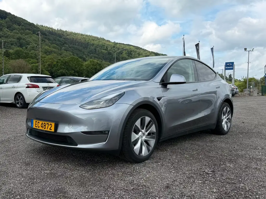 Main__Slider__Photo:Tesla Model Y Long Range Dual AWD 02/2024-0