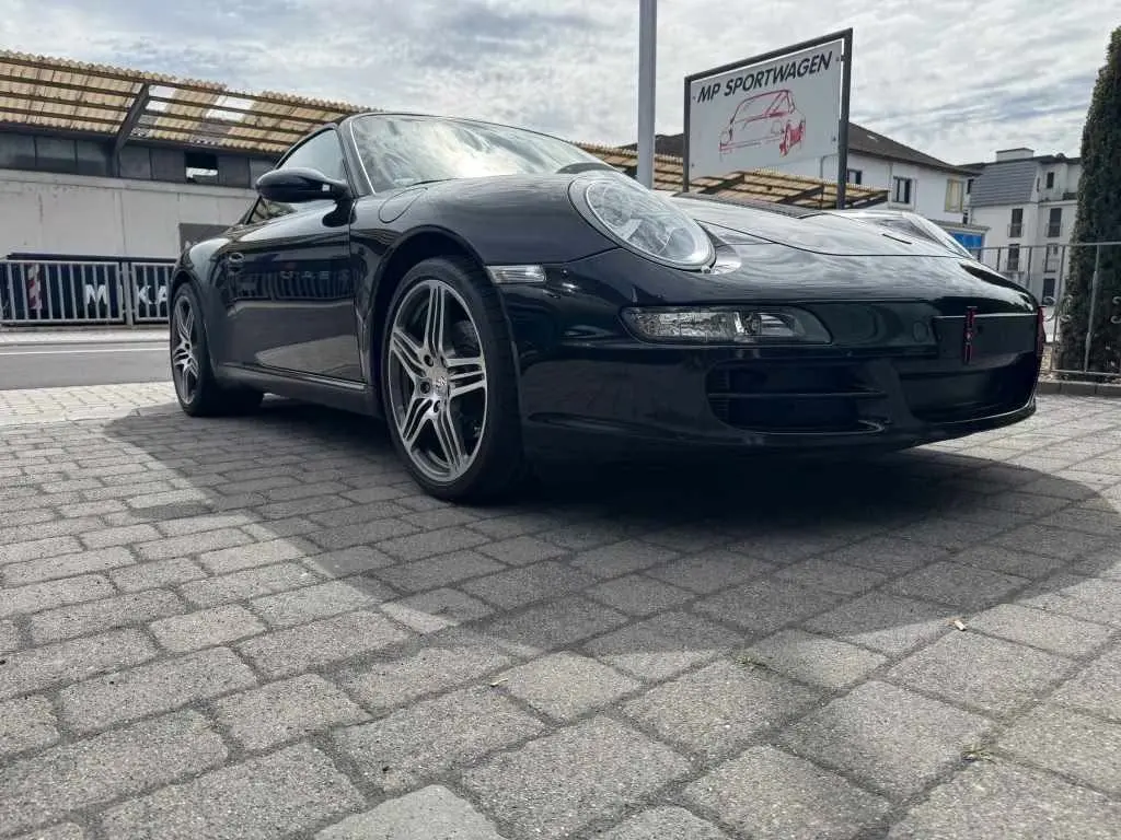 Main__Slider__Photo:Porsche 997 Cabrio Deutsch Scheckheft 02/2007-1